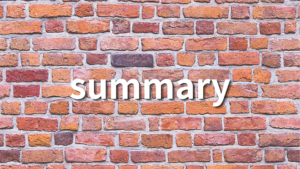 赤煉瓦の壁にに「summary」と英語が書いてある
